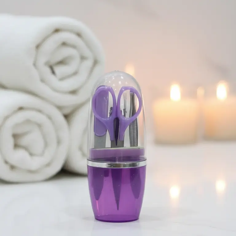 Compact manicure kit displayed near folded towels