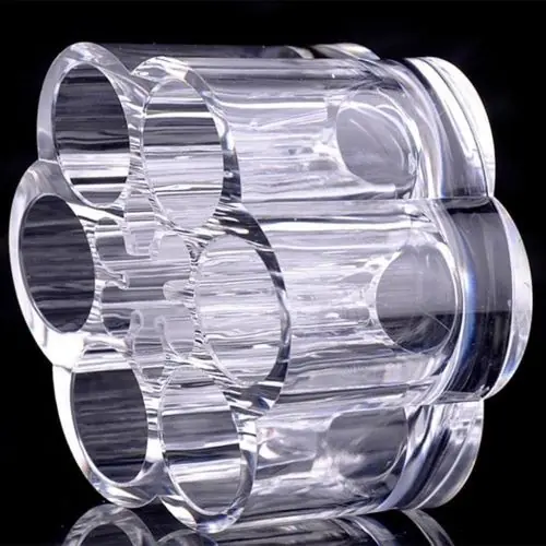 Side view of six cylindrical compartments in a clear organizer