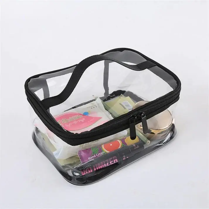 Transparent travel cosmetic bag filled with small beauty products